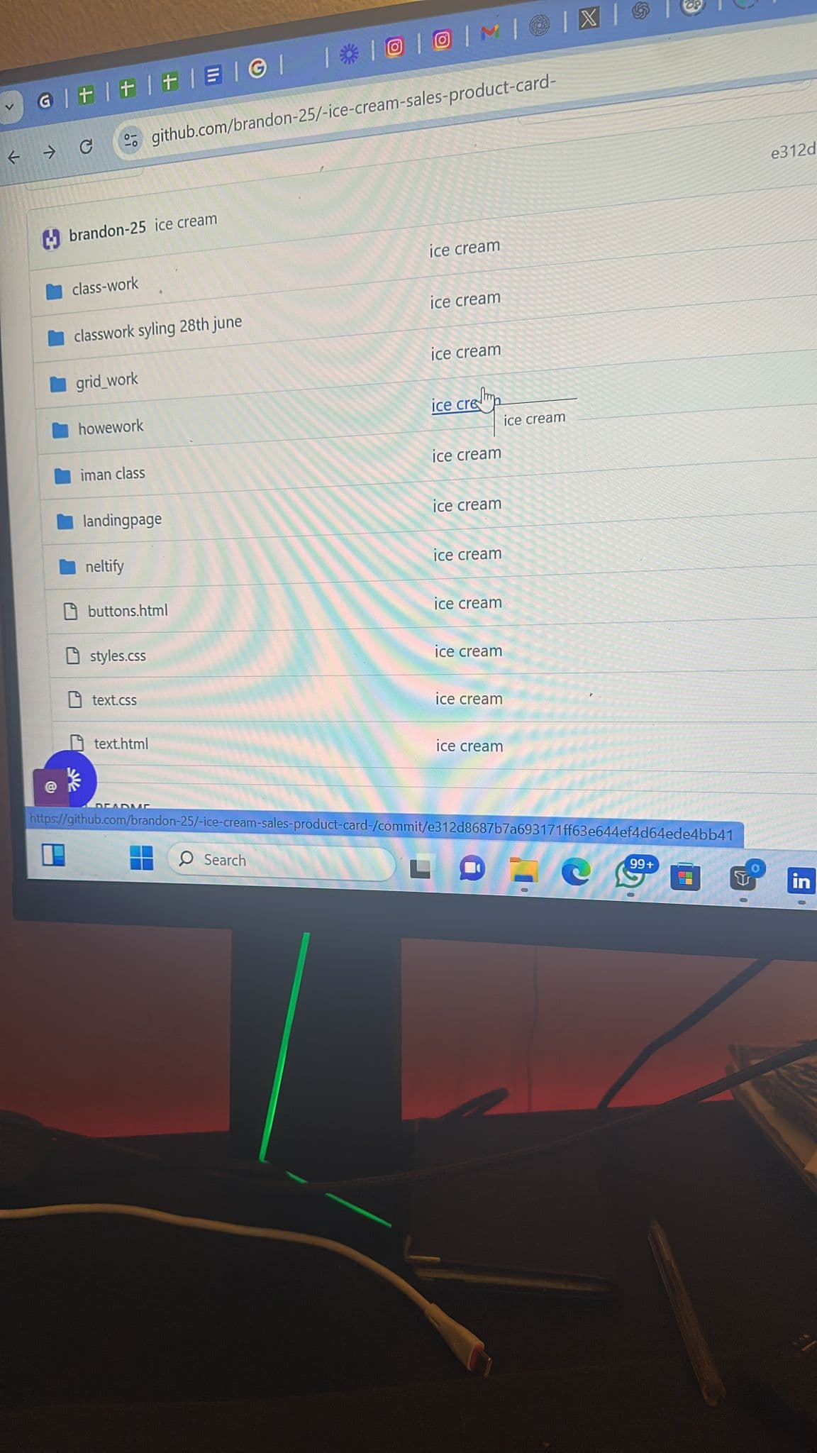Monitor showing Brandon's GitHub repository with class-work, homework, and landing-page folders
