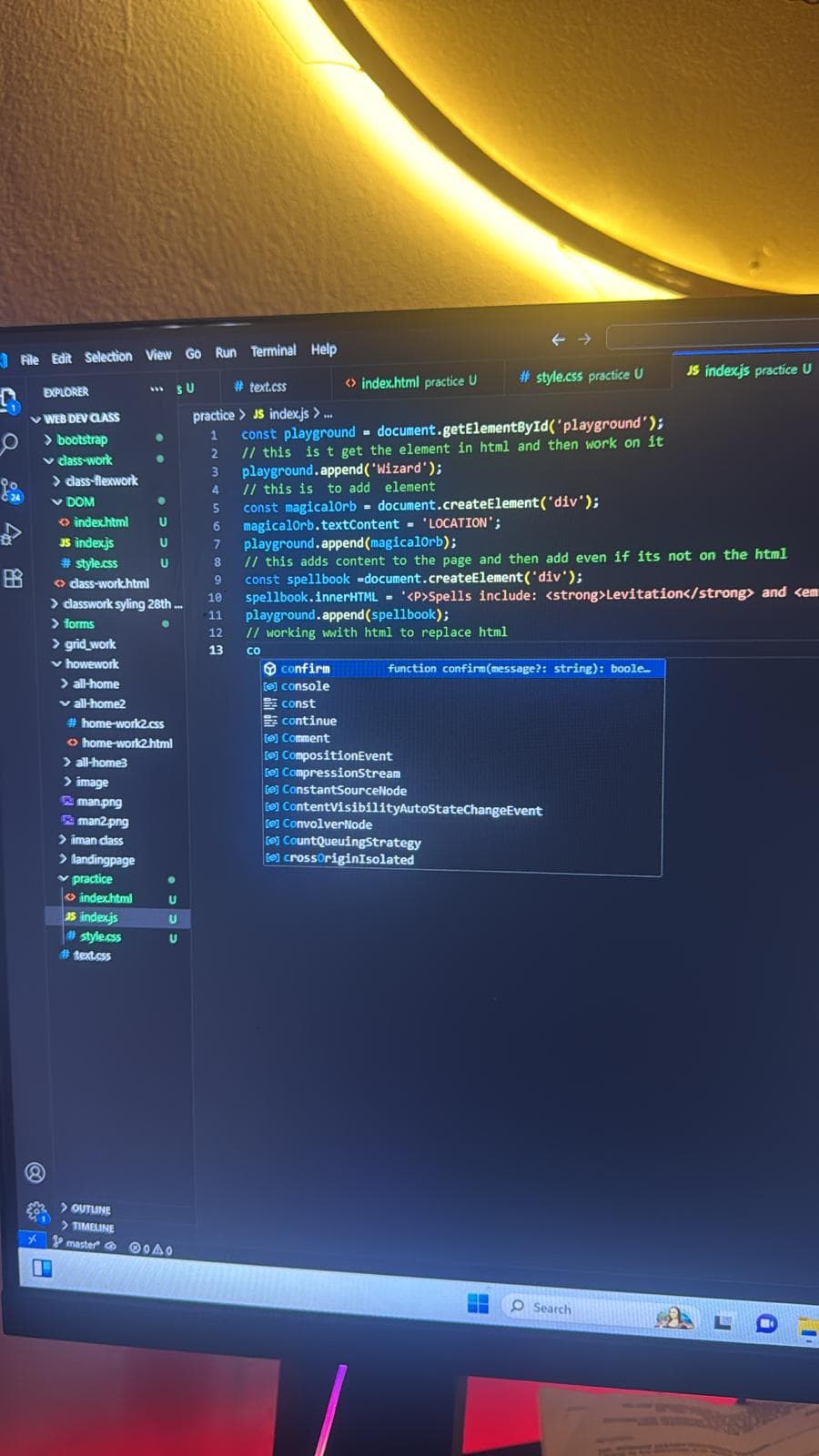 Visual Studio Code open to JavaScript DOM practice inside a web development class folder